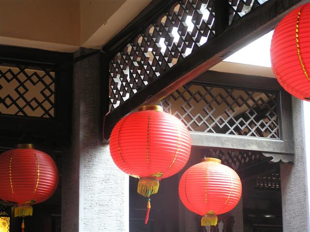 Three and a half lanterns hanging on the wall